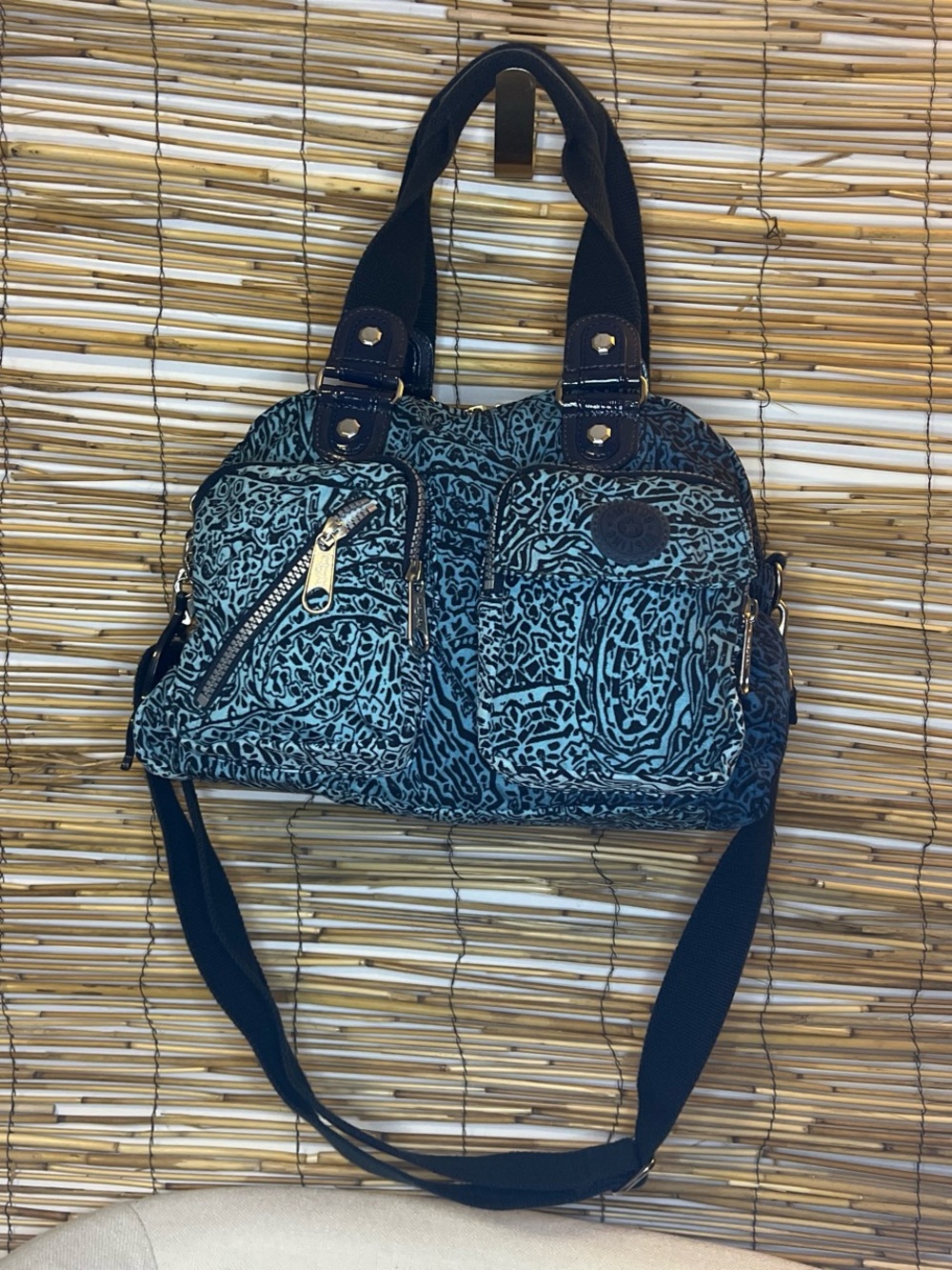 Teal and Black Patterned Shoulder Bag with Multiple Pockets